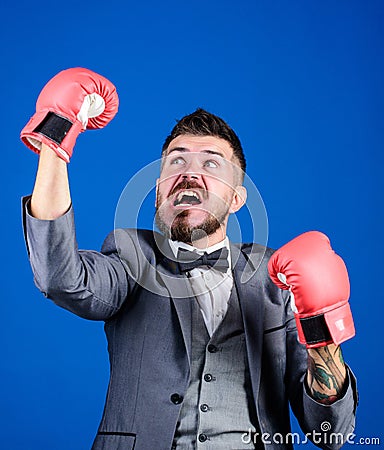 We did it. powerful man boxer ready for corporate battle. Business and sport success. bearded man in boxing gloves Stock Photo