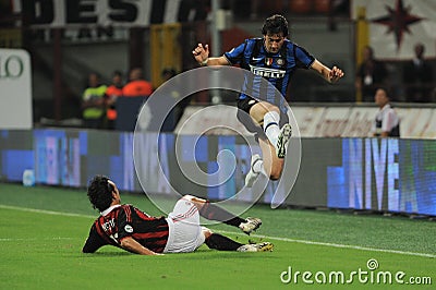 Diego Milito and Alessandro Nesta in action during the match Editorial Stock Photo