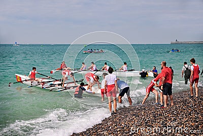 DIEPPE, FRANCE - MAY 25, 2019: French Rowing Championship. Water Rowing boats with teams Editorial Stock Photo