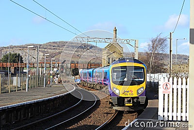 Diesel multiple unit train arriving at station Editorial Stock Photo