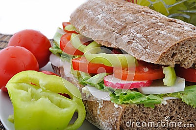 Diet brown baguette with vegetable Stock Photo