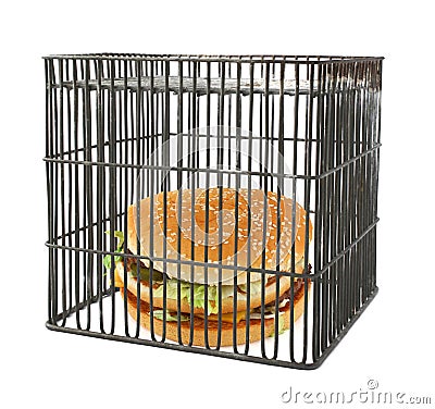 Diet concept - fast food behind bars Stock Photo