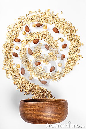 Diet food concept, oat flakes with almond and hazelnuts Stock Photo