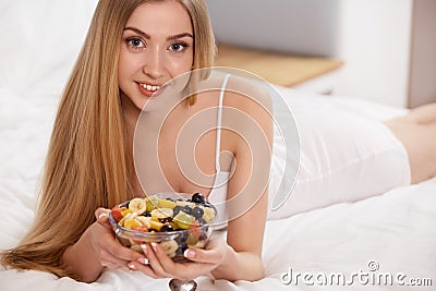 Diet. Healthy Food Ð¡oncept. Beautiful Woman Have a Breakfast Stock Photo