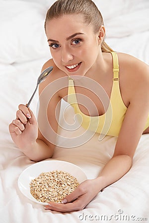 Diet. Healthy Food Ð¡oncept. Beautiful Woman Have a Breakfast Stock Photo