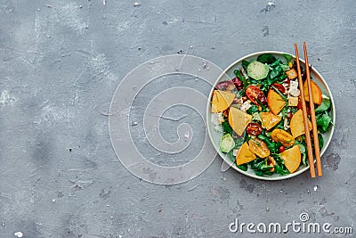 Diet salad with persimmon, top view, Fresh Salad with persimmons, Stock Photo