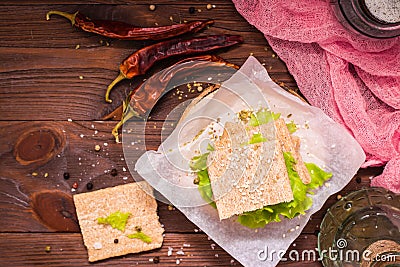 Dietary sandwiches from cereal bread and salad leaves Stock Photo