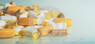 Dietary Supplements macro photo: multivitamin tablets, softgels with Omega-3 and Vitamin D3, antioxidants and capsules Stock Photo