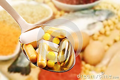 Dietary supplements on protein food background Stock Photo