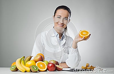 Dietician holding an orange Stock Photo