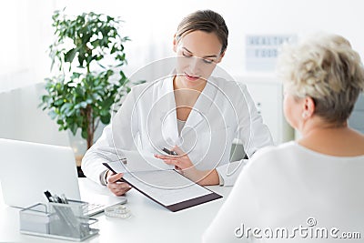 Dietician showing diet plan Stock Photo