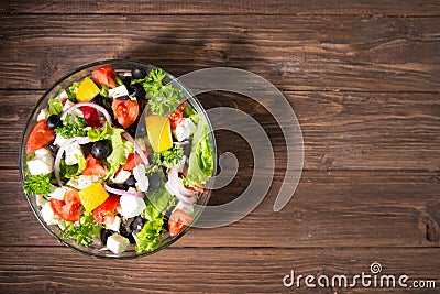 Dieting healthy salad on rustic wooden table top view Stock Photo