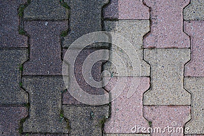 Difference between clean driveway autoblocking slabs interlock and dirty after cleaning high pressure jet Stock Photo