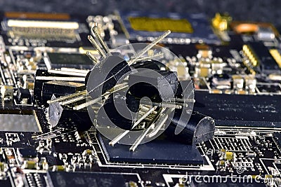 The difference in the size of transistors in the TO92 package and uncased electronic components Stock Photo