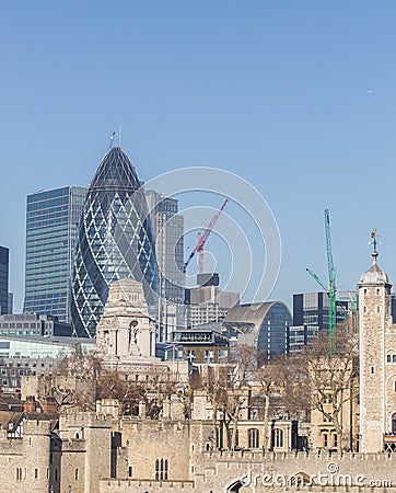 Saint Mary Axe and Tower of London . Editorial Stock Photo