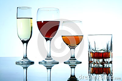 Different Alcoholic Drinks in glass and goblets Stock Photo