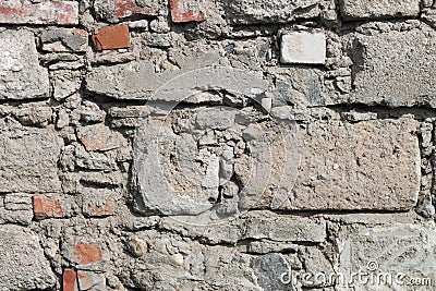 Different bricks in the wall background texture red gray Stock Photo