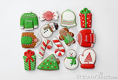 Different Christmas gingerbread cookies on white background, top view Stock Photo