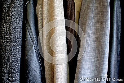 Different clothes placed in the wardrobe. Good texture Stock Photo