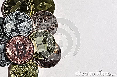 different coins cryptocurrencies bitcoin litcoin Ethereum and others close up on a light background Editorial Stock Photo