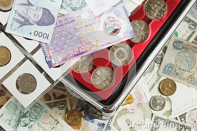 Different collector`s coins and banknotes Stock Photo