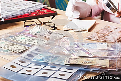 Different collector`s coins and banknotes Stock Photo