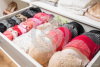 Different color bras in drawer Stock Photo