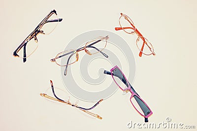 Different colored eyeglasses on white background Stock Photo