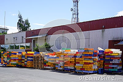 Fish boxes in the port Editorial Stock Photo