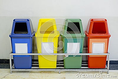Different Colored wheelie bins set with waste icon Stock Photo