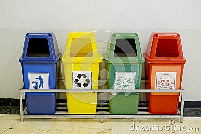 Different Colored wheelie bins set with waste icon Stock Photo