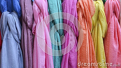 Different colors of silk and colorful background Stock Photo