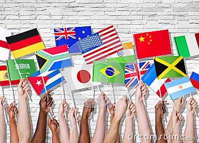 Different Countries United With Their Flags Raised Stock Photo