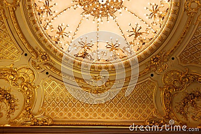 Different details of a luxurious theater with gold touches and stained glass Stock Photo