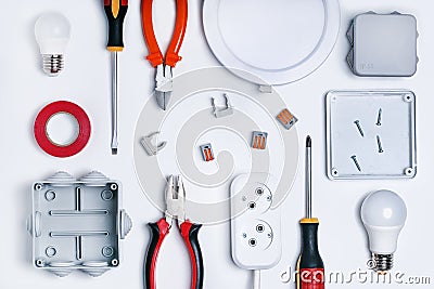 Different electrical tools on light grey background, top view. Stock Photo