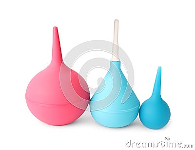 Different enemas on white background. Medical treatment Stock Photo