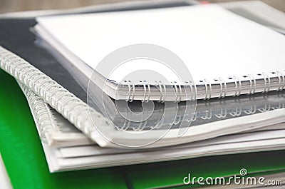 Different folders, documents and notebooks close-up. Business papers on the office desk. Stock Photo