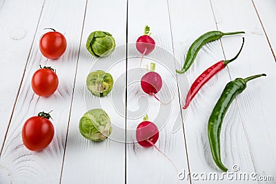 Different fresh seasonal vegetables in rows Stock Photo