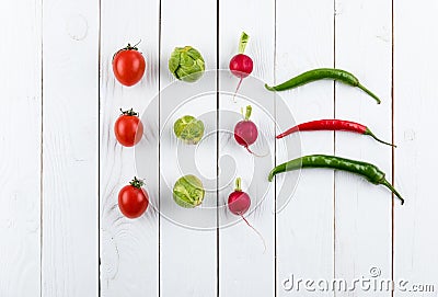 Different fresh seasonal vegetables in rows Stock Photo