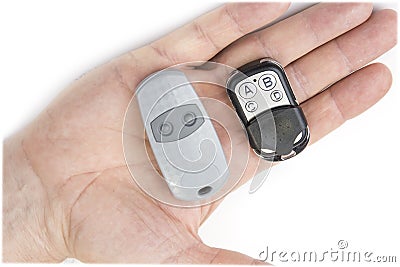 Different garage wireless remote controls for opening and closing. Stock Photo