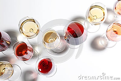 Different glasses with wine on white background Stock Photo