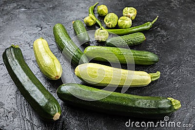 Different green fresh seasonal vegetables Stock Photo