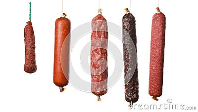 Different hanging sausages isolated on background Stock Photo