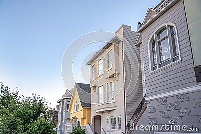 Different home exteriors in San Francisco, California against the sunset sky background Stock Photo