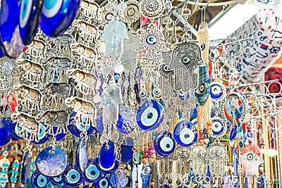 Different jewish souvenirs as Hamsa with Shalom Peace and other sale at the popular marketplace in Tel Aviv, Israel. Selective f Stock Photo
