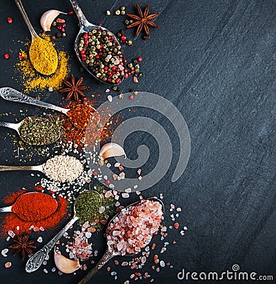 Different kind of spices in vintage spoons Stock Photo