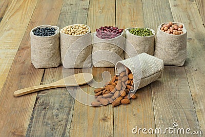 Different kinds of beans in sacks bag Stock Photo