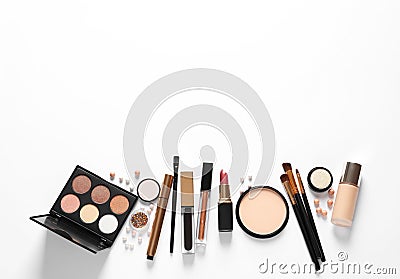 Different luxury makeup products on white background Stock Photo