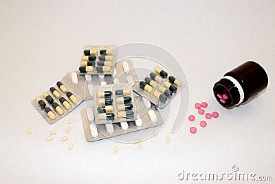 Medications: pills in a blister pack, tablets in a bottle Stock Photo