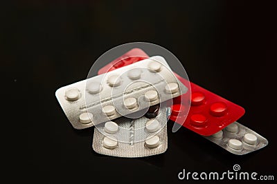 Different medicines. Tablets, pills in blister pack. Medications drugs, flat lay, overhead Stock Photo